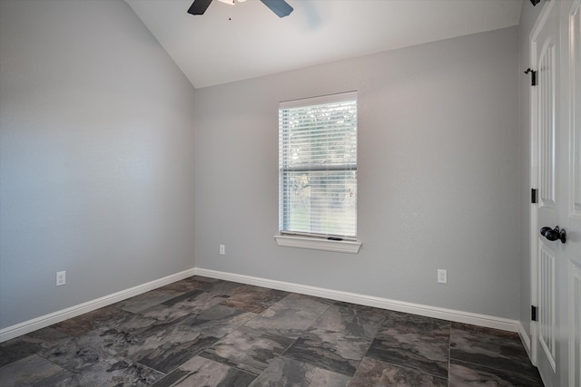 unfurnished room with ceiling fan and lofted ceiling