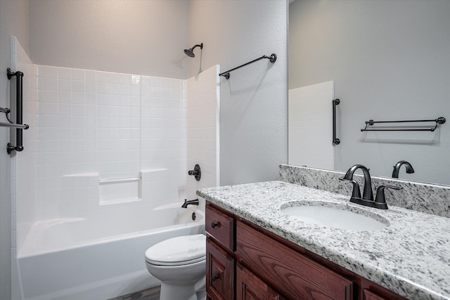 full bathroom featuring shower / bath combination, vanity, and toilet