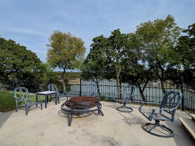 view of patio / terrace featuring an outdoor fire pit