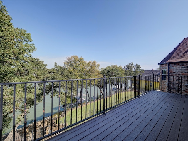 deck featuring a water view