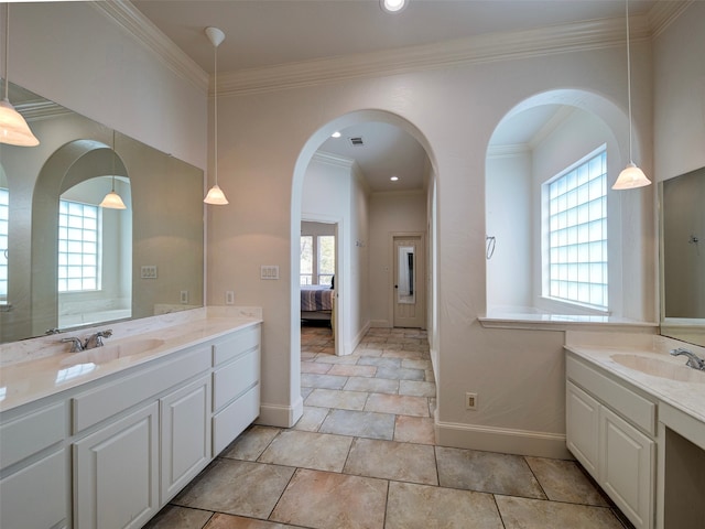 bathroom featuring vanity and crown molding