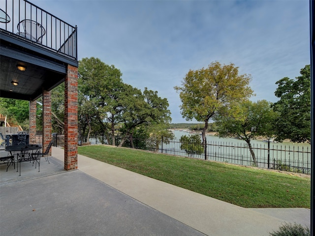 view of patio / terrace featuring a water view