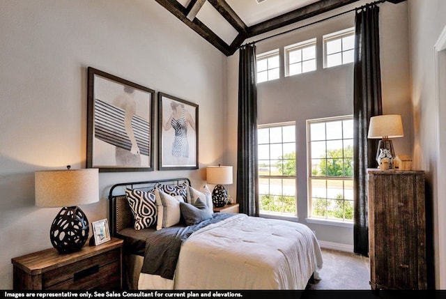 bedroom featuring beam ceiling, light colored carpet, and high vaulted ceiling