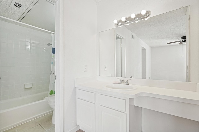 full bathroom with shower / bath combination with curtain, ceiling fan, vanity, tile patterned floors, and toilet