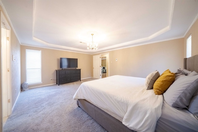 bedroom with light colored carpet, a chandelier, and a raised ceiling