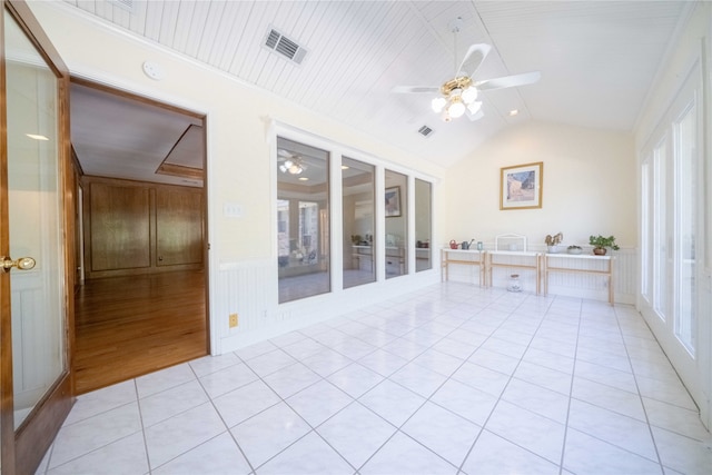 interior space featuring lofted ceiling and ceiling fan