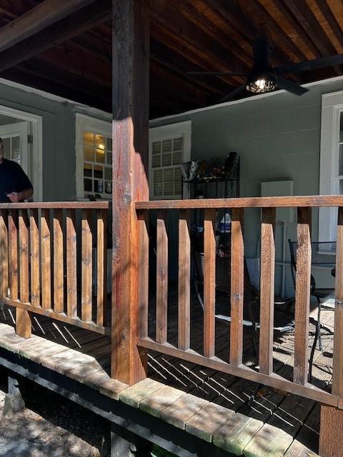 wooden deck with ceiling fan