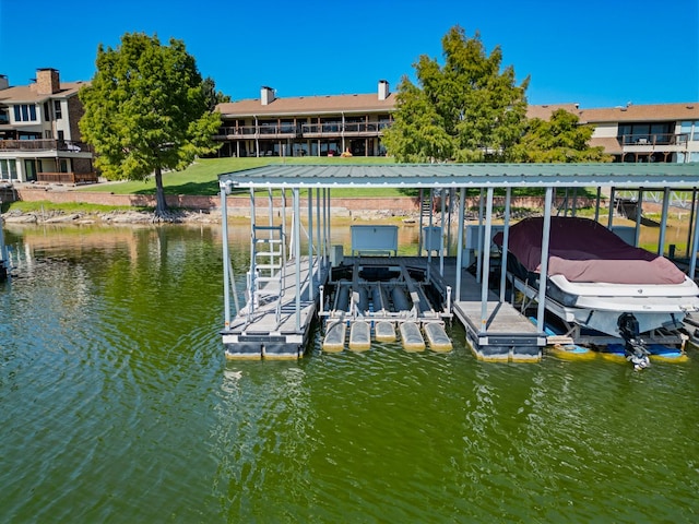 dock area featuring a water view