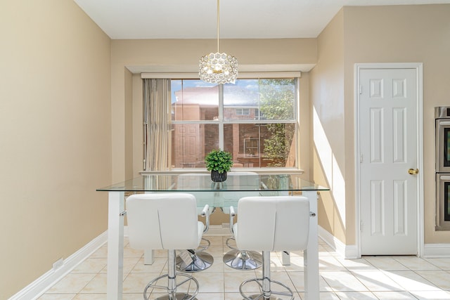 unfurnished dining area featuring light tile patterned floors and an inviting chandelier