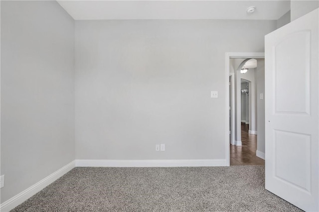 spare room featuring carpet floors