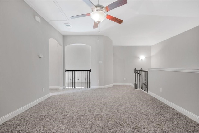 spare room with ceiling fan and carpet flooring