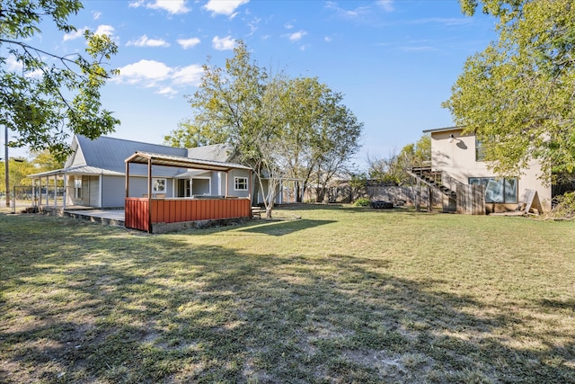 view of yard featuring a deck