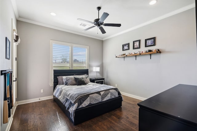 bedroom with dark hardwood / wood-style flooring, ceiling fan, and crown molding