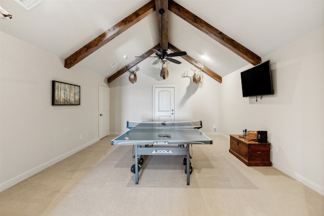 rec room with vaulted ceiling with beams, ceiling fan, and light carpet