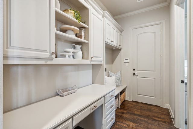 interior space with crown molding and dark wood-type flooring