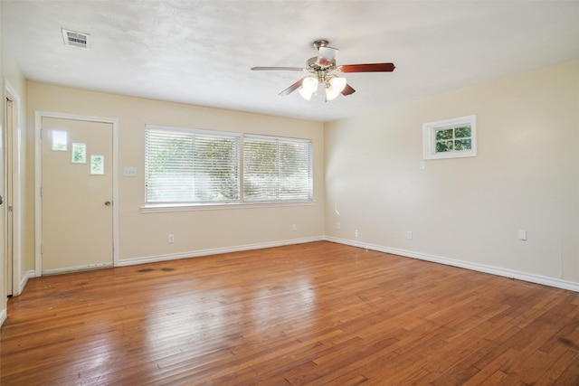 interior space featuring wood-type flooring and ceiling fan