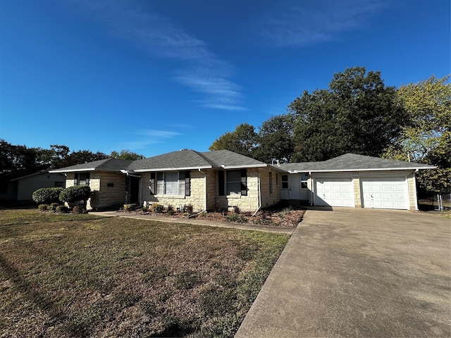 ranch-style home with a front lawn and a garage