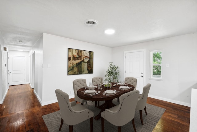 dining room featuring dark hardwood / wood-style flooring