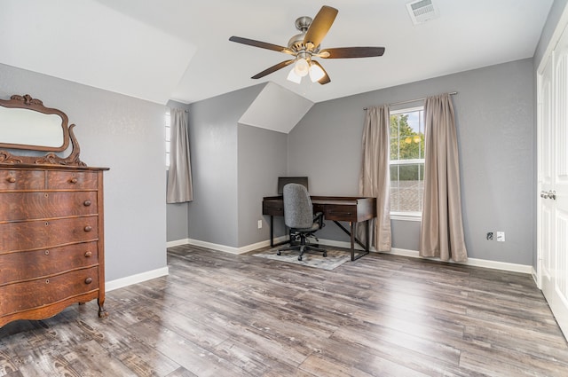 office area with lofted ceiling, baseboards, visible vents, and wood finished floors