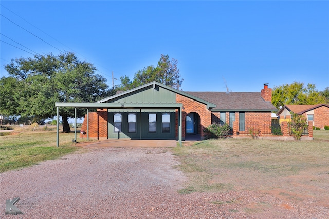 view of front facade featuring a carport