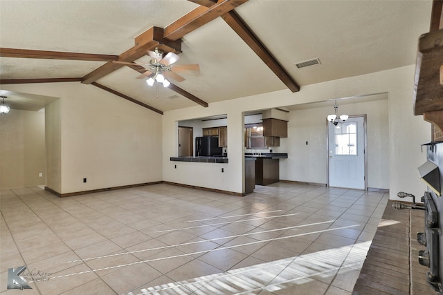 unfurnished living room featuring lofted ceiling with beams, a textured ceiling, ceiling fan with notable chandelier, and light tile patterned floors