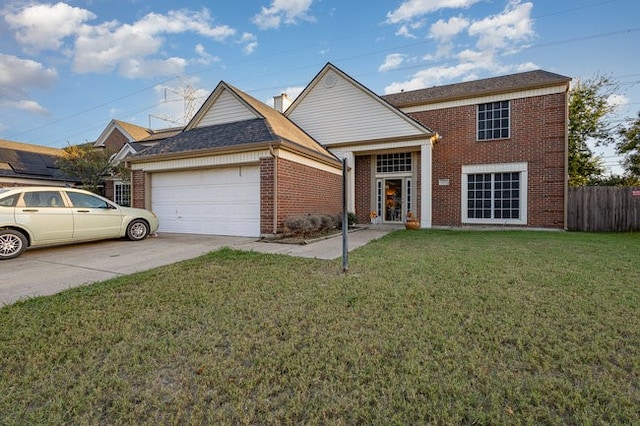 front of property featuring a garage and a front lawn