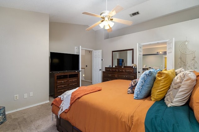 bedroom with high vaulted ceiling, carpet flooring, and ceiling fan