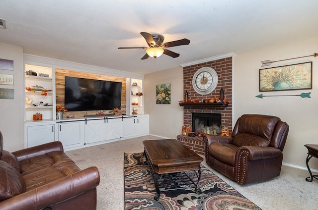 living room featuring a brick fireplace, ceiling fan, built in shelves, and light colored carpet