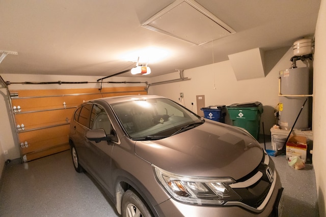 garage featuring water heater, electric panel, and a garage door opener