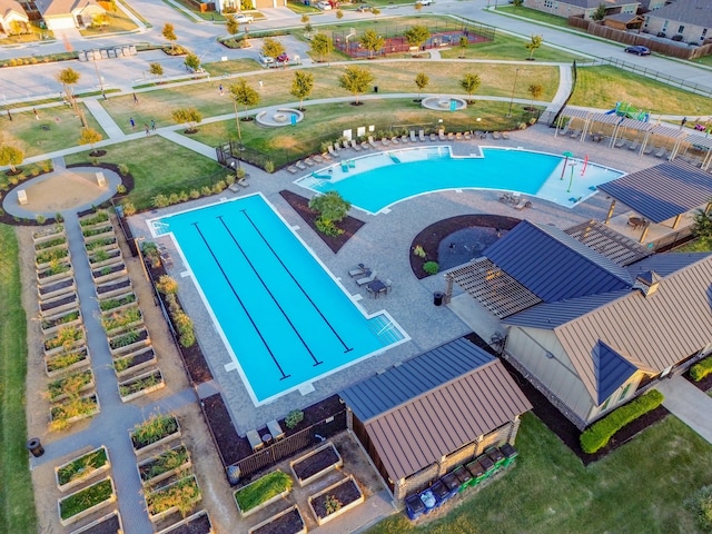 view of swimming pool with a patio