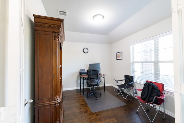 home office with dark wood-type flooring