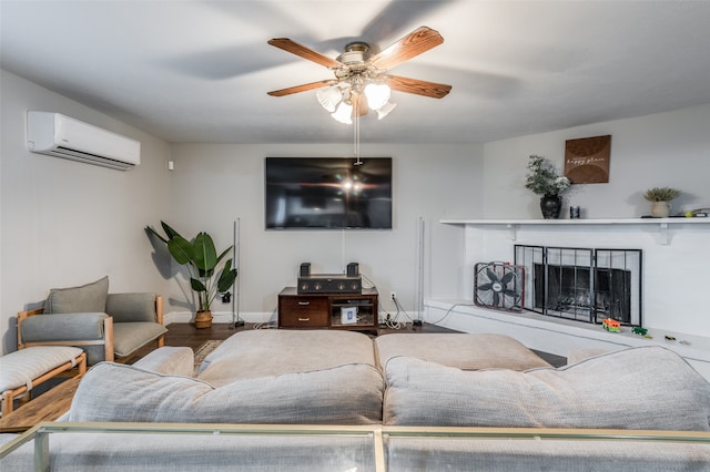 living room with a wall mounted air conditioner, wood-type flooring, and ceiling fan