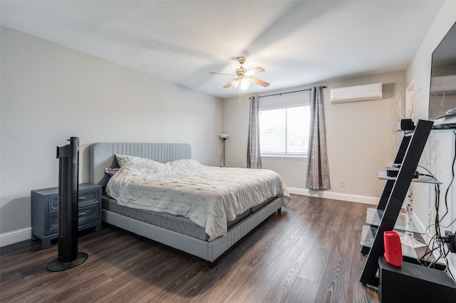 bedroom featuring dark wood-type flooring, a wall mounted AC, and ceiling fan