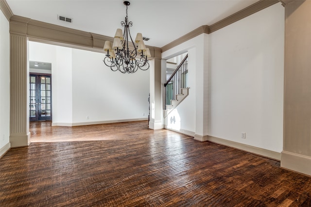 unfurnished dining area featuring ornamental molding, a chandelier, and dark hardwood / wood-style floors