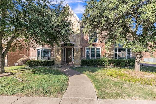 view of front facade with a front lawn