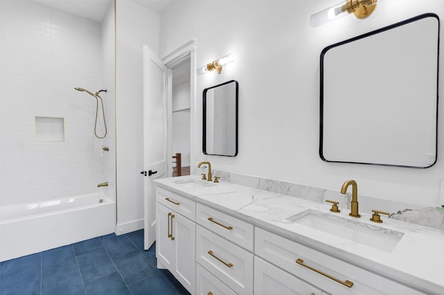 bathroom with tile patterned flooring, vanity, and washtub / shower combination