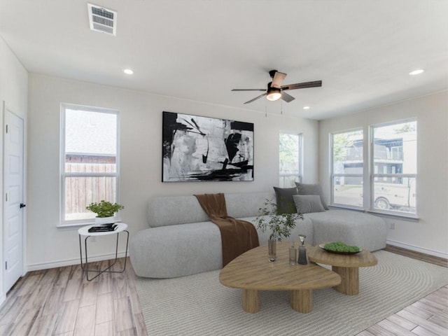 1610 Life Ave, Dallas, TX 75212 - living room featuring a ceiling fan, light wood finished floors, recessed lighting, and baseboards