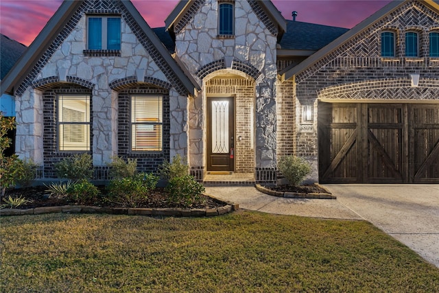 view of front of house with a lawn