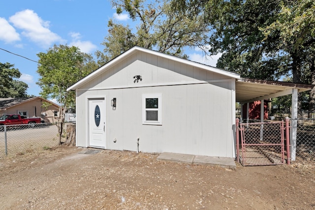 view of outdoor structure featuring a carport