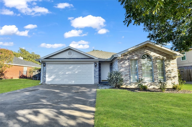 single story home featuring a front yard and a garage