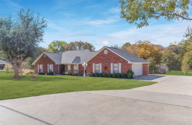 single story home with a front lawn and a garage