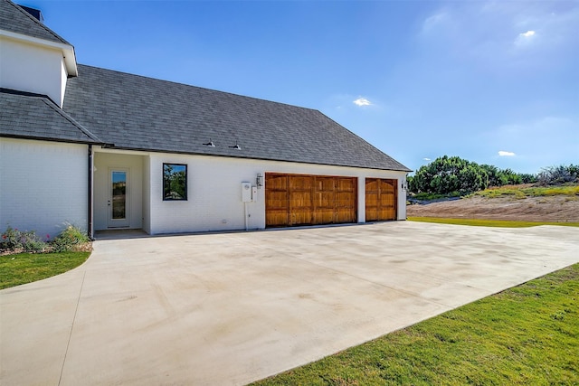 exterior space with a garage