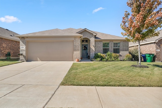 ranch-style home featuring a front lawn and a garage