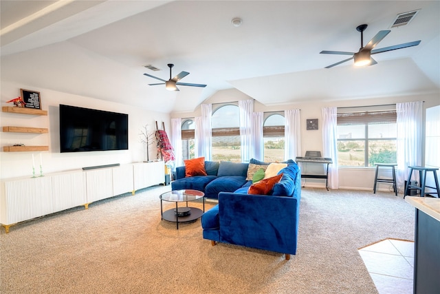 living room with carpet floors, ceiling fan, and lofted ceiling