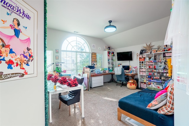 bedroom with carpet flooring and vaulted ceiling