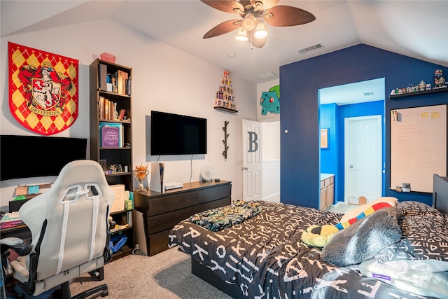 carpeted bedroom with vaulted ceiling and ceiling fan