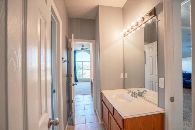 bathroom featuring vanity, tile patterned floors, and ceiling fan