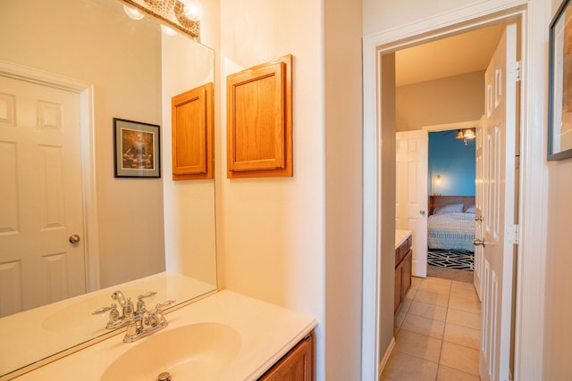 bathroom featuring tile patterned floors and vanity