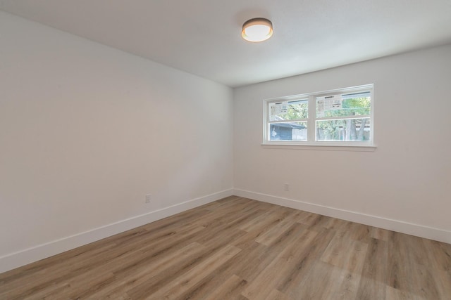 empty room featuring light hardwood / wood-style floors