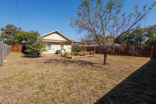 view of yard featuring central AC